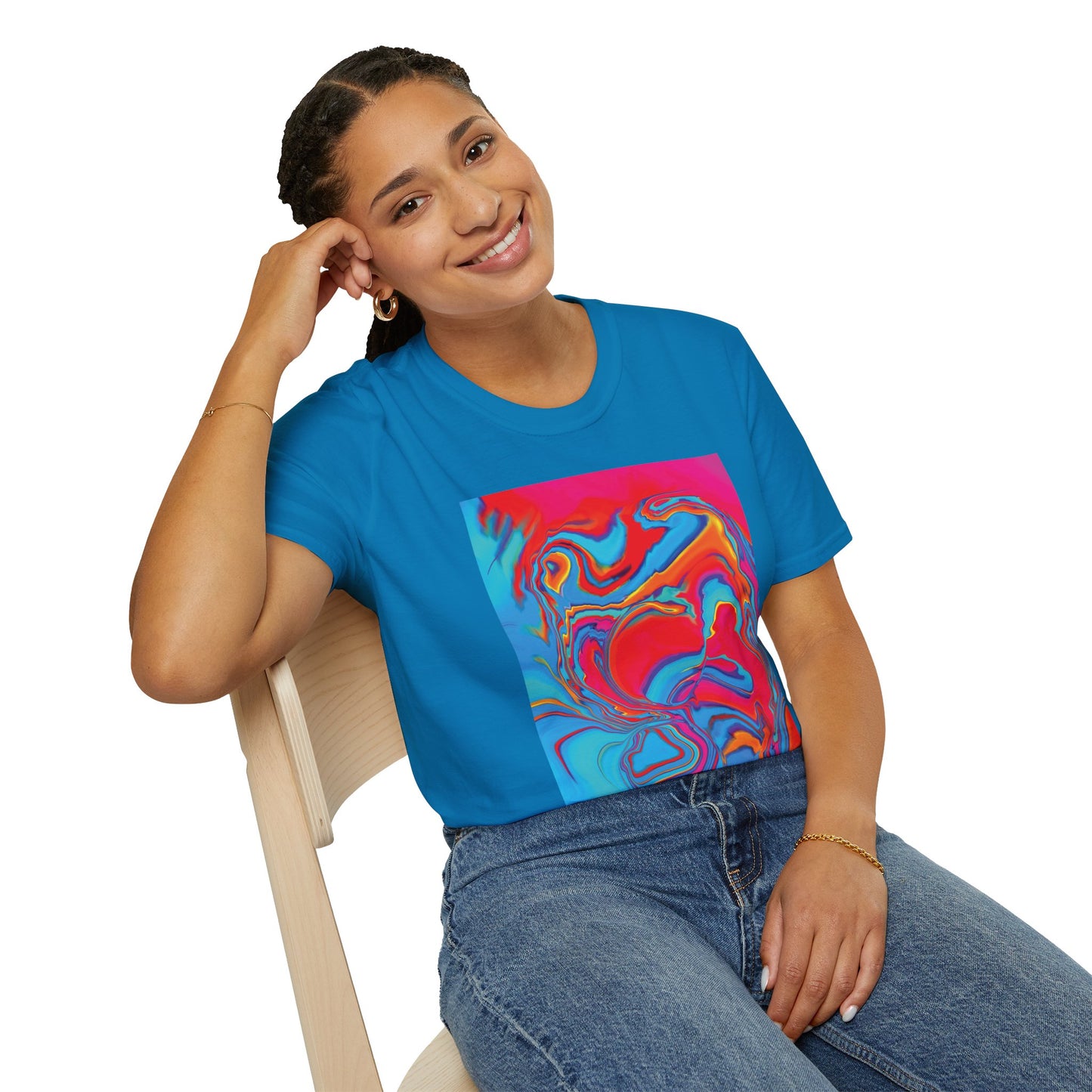 A seated woman wearing Bryan Dodson's Improvisational Abstract Multicolor T-Shirt in Sapphire