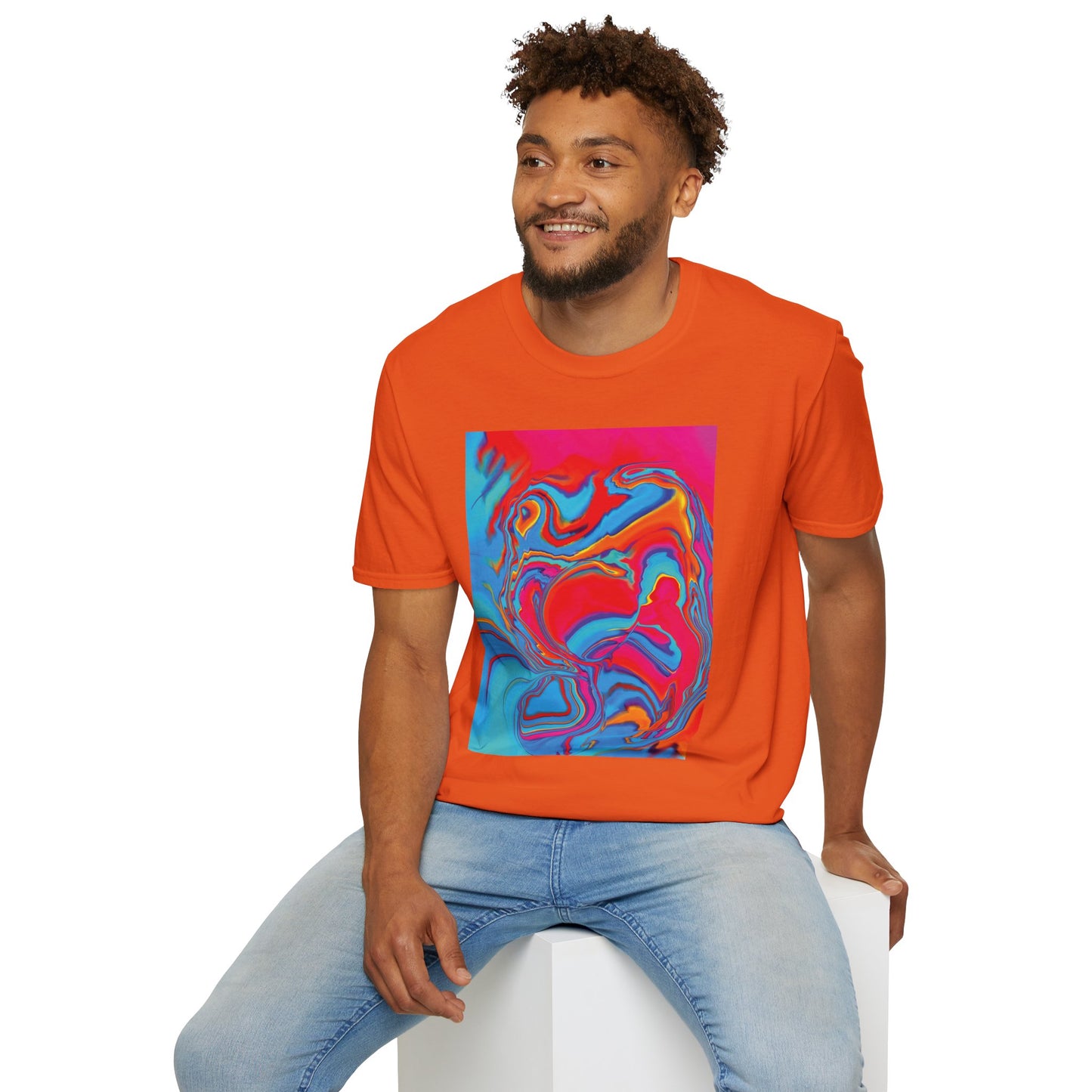 A seated man wearing Bryan Dodson's Improvisational Abstract Multicolor T-Shirt in Orange