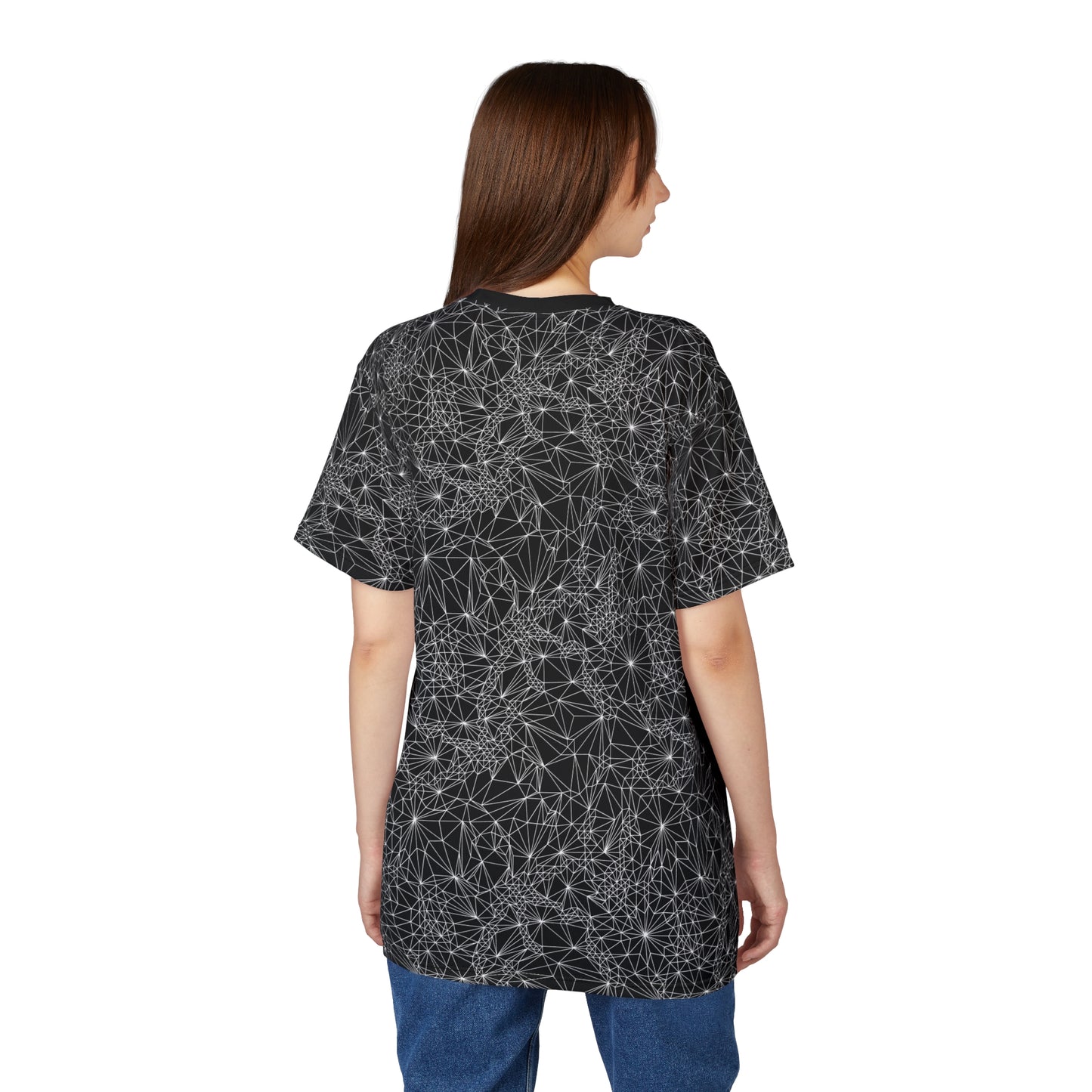Back of woman wearing Black and White Tri-Geometric t-shirt paired with jeans