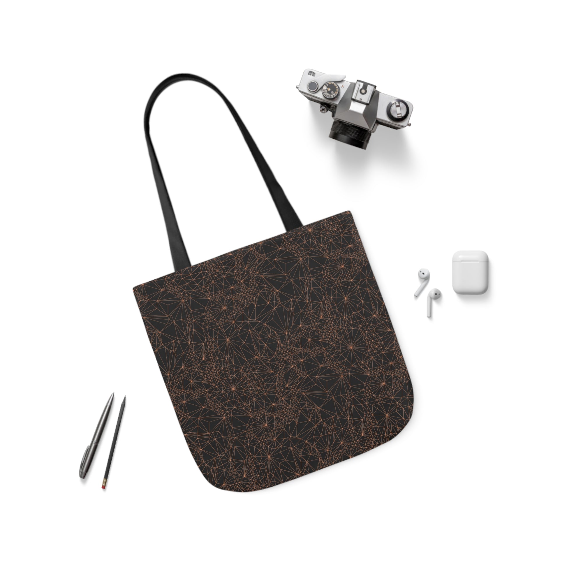 Tri-Mesh Geometric by Michelle Penland Dodson, Canvas Tote Bag alongside a camera, AirPods, and a pen and pencil. 16x16