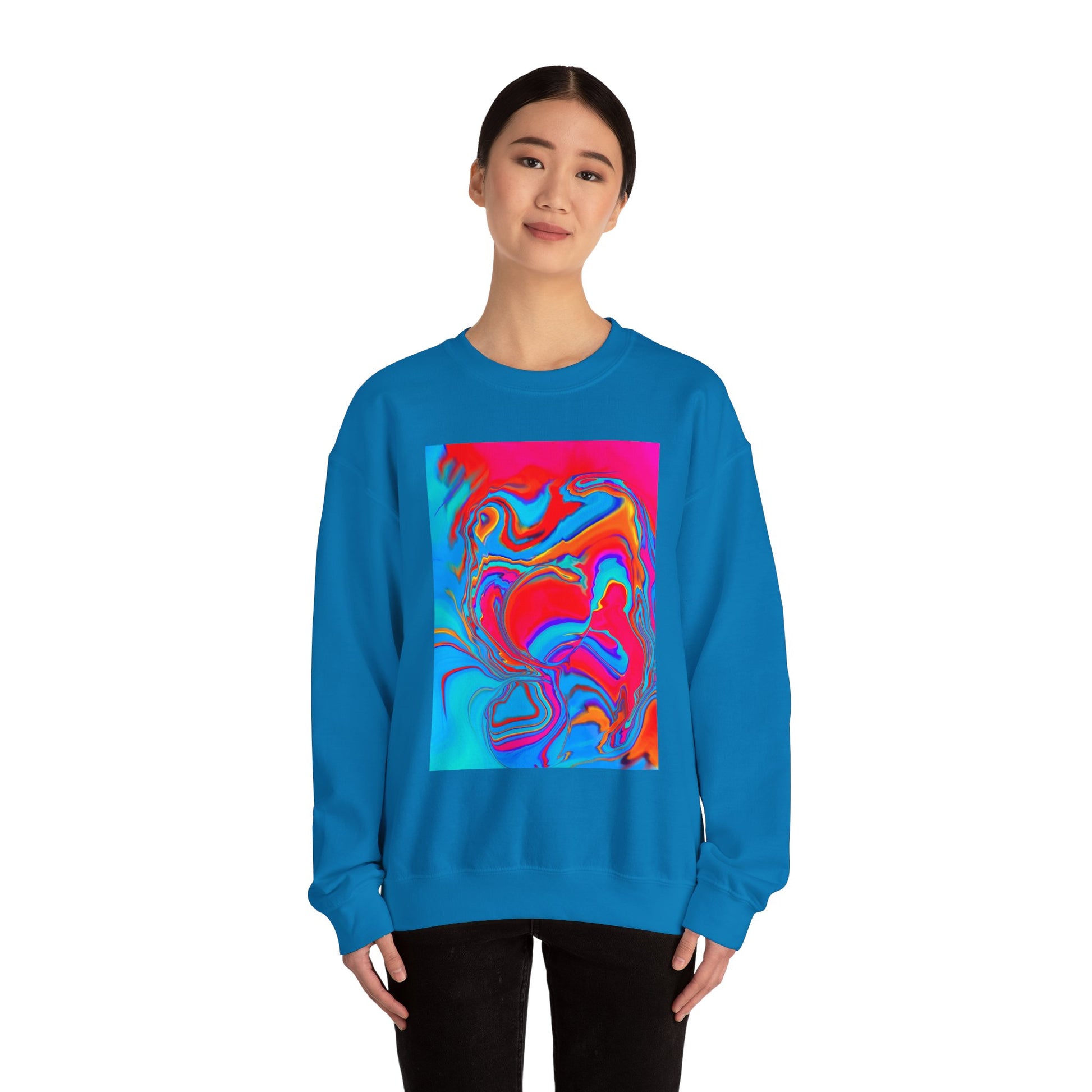 A woman wearing the The colorful and psychedelic Improvisational Abstract Crewneck Sweatshirt by Bryan Dodson folded